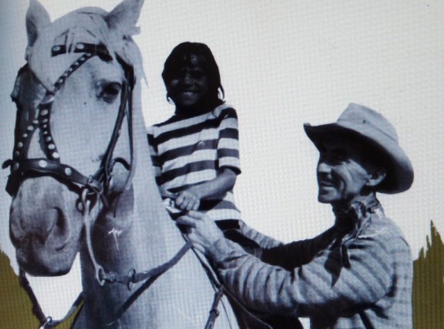 Smokey Dawson with Aboriginal child